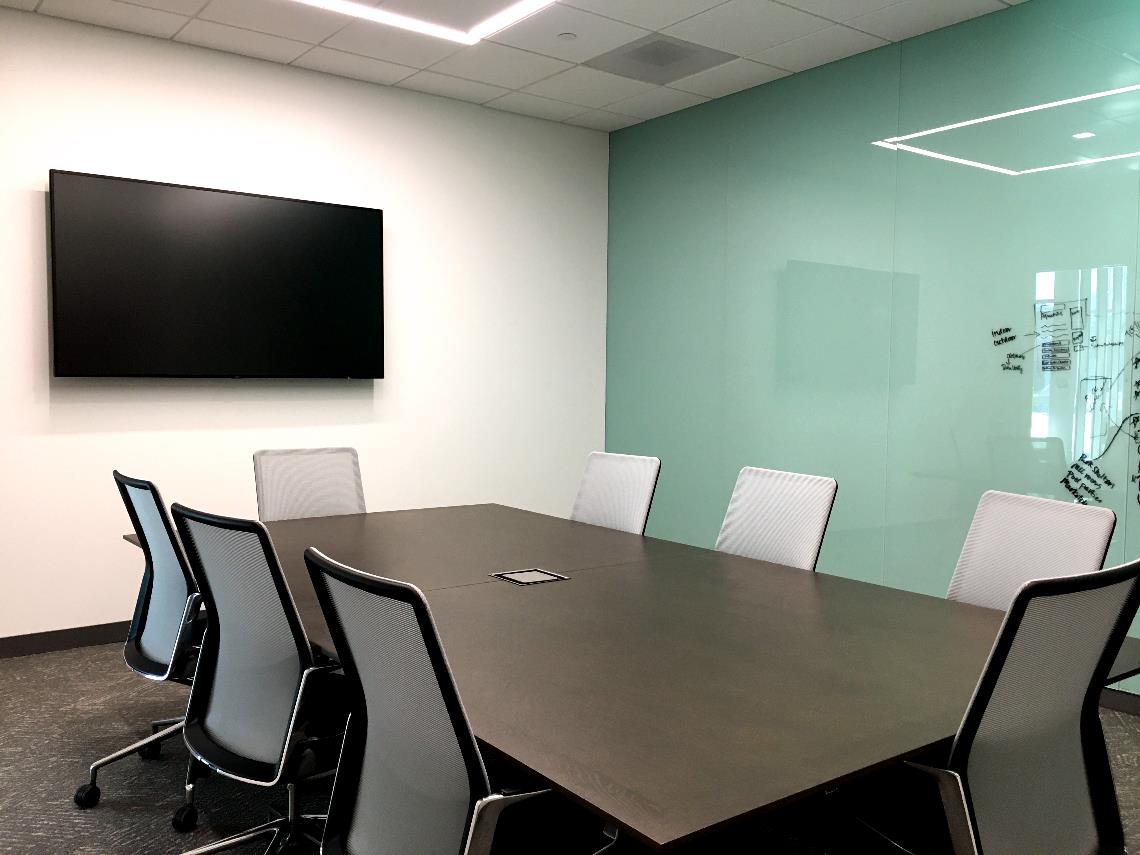 Meeting room with TV and dry erase wall