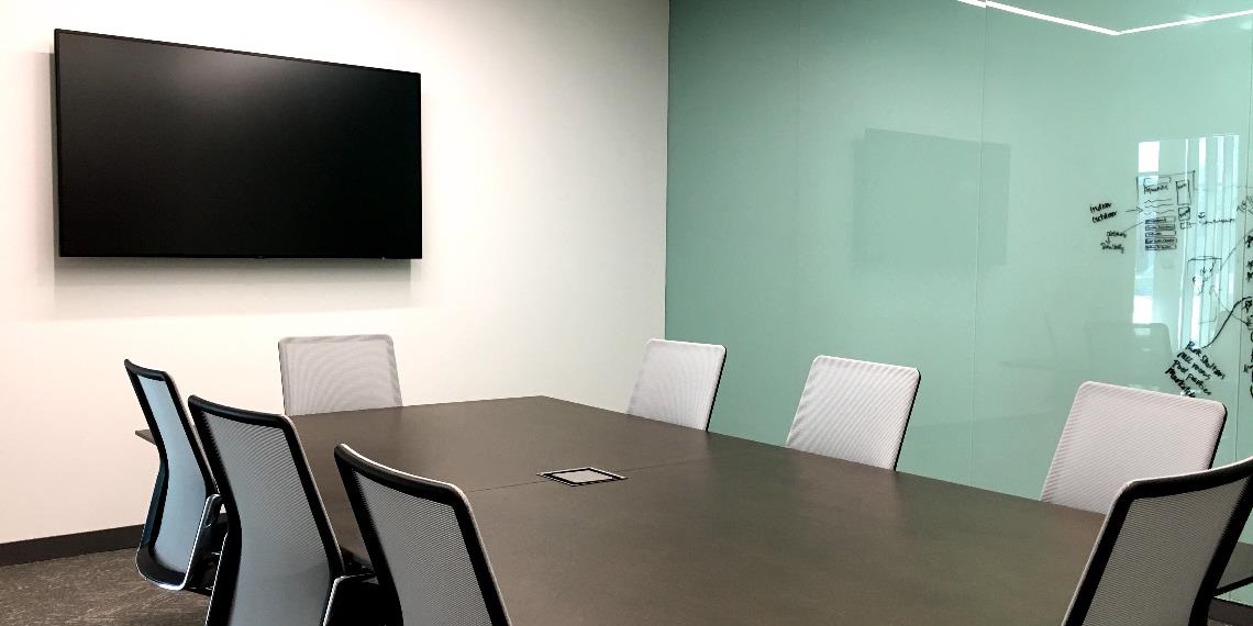 Meeting room with TV and dry erase wall